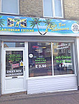 876 Caribbean Cuisine outside