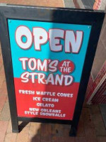 Tom's At The Strand inside