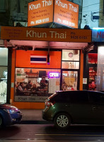 Khun Thai outside