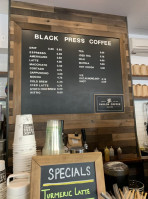 Black Press Coffee inside