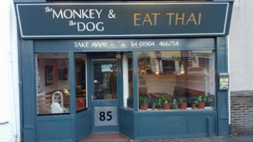The Monkey And The Dog Eat Thai outside