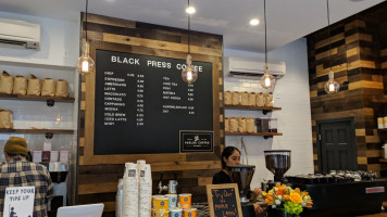 Black Press Coffee inside