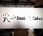 RAP STEAKS AND CAKES inside