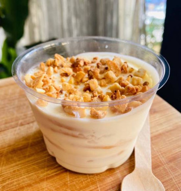 White Chocolate Biscuit Pudding Topped With Roasted Cashew