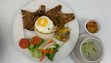 Com Dac Biet Rice With Grilled Pork Chop, Egg, And Egg Cake
