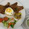 Com Dac Biet Rice With Grilled Pork Chop, Egg, And Egg Cake