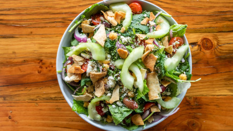 Mediterranean Romaine Kale, Tomatoes, Red Onion, Kalamata Olives, Cucumbers, Feta Cheese, Chickpeas, Herb Mix With Housemade Lemon Basil Vinaigrette