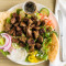 Greek Salad Topped With Lamb Gyro