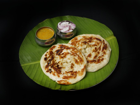 Parotta (2 Pcs (South Indian Delicious, Tawa Roasted Fluffy Bread Served With Khurume Or Chana Masala.