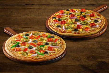Średnia Pizza Z Dwoma Załadowanymi Warzywami.