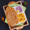 Chicken Mughlai Gravy With Triangle Paratha