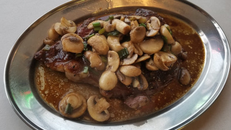 Angus Ribeye With Sauteed Mushrooms