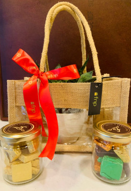 2 Jars Of Homemade Chocolate With Sansevieria Plant