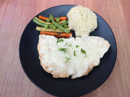 Chicken Steak In Cheese Sauce With Mash And Sauteed Veggies