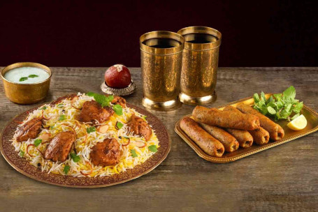 Chicken Biryani (Shaan-E-Bhuna Murgh, 2-3 Porții) 6 Bucăți Chicken Seekh Kebab 2 Thums Up 250 Ml