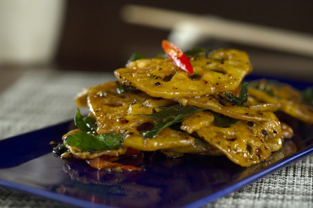 Crispy Lotus Stem With Curry Leaves And Black Pepper