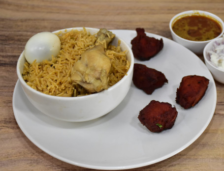Chicken 65 Biriyani [Served With Raita Salan.