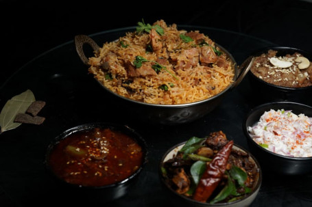 Mutton Biryani, Chicken Chukka, Raitha, Brinjal Sweet