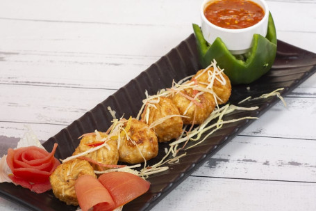 Momos Di Pollo Fritto Con Salsa Al Formaggio (6 Pezzi)