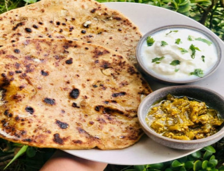 Aloo Achari Paratha With Curd, Chutney And Achaar