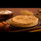 Desi Ghee Pyaz Special Parantha Served With Curd, Chutney And Achaar