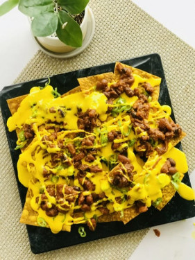 Nachos With Refried Beans And Cheese