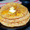 Paneer Paratha With Curd And Chilli Pickle