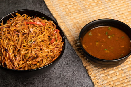 Schezwan Veg Noodles With Plain Manchurian Sauce