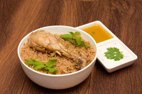Chicken Biryani (Served With Raita Chicken Kulambu.