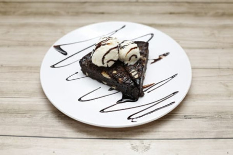 Hot Brownie Topped With Ice Cream