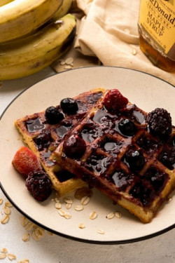 Waffle With Fresh Fruits And Maple Syrup