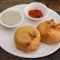 Potato Vada 4 Pcs Served With Hari Chutney Meethi Chutney Coke 250 Ml