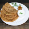 2 Sattu Paratha Served With Curd Pickle
