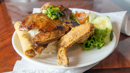 R1. Grilled Pork Chop, Fried Chicken Wing And Egg Roll Over Rice Combo Plate