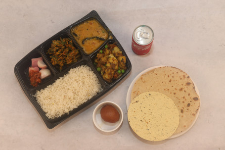 Aloo Matar (Dal , Bhindi Kurkuri, Rice , Roti , Sweet, Coldrink, Papad, Achar)