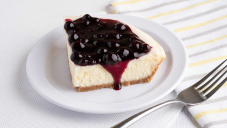 Cheesecake With Blueberry Topping Slice