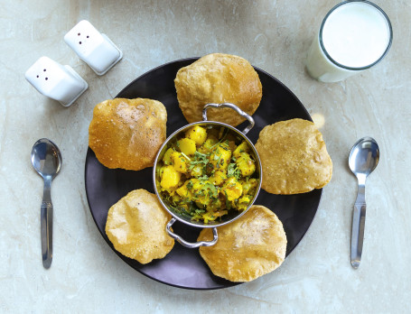 Poori Bhaji (Yellow Gravy)