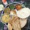 Bhojan Thali Dal rice Sabji Aachar salad papad 5 Roti