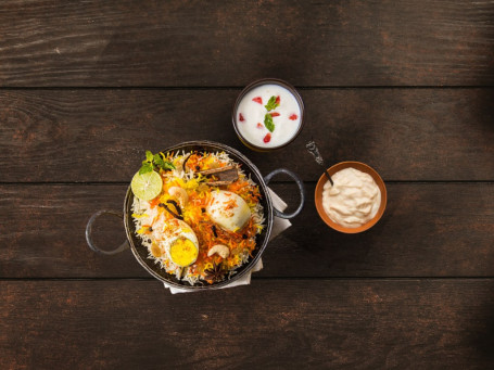 Egg Biryani With Raita Mishti Doi