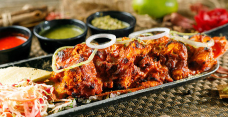 Shahi Paneer Tikka Served With Mint Chutney And Salad