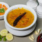Butter Dal Khichdi Served With Raita