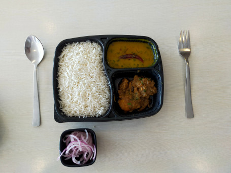 Non Veg Thali( Basmati Rice,Dal Fry, Chicken Butter Masala, And Onions)