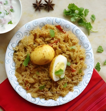 Egg Pulao Served With Raita