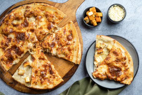 8 Small Tandoori Paneer Pizza+Pepsi