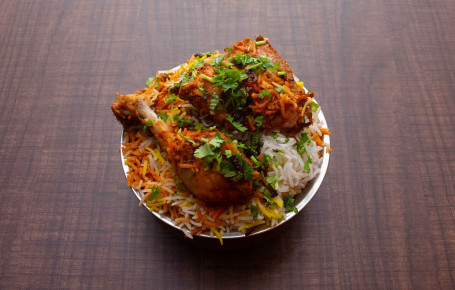 Chicken Dum Biryani (Served With Raita And Salan)(2 Pcs)