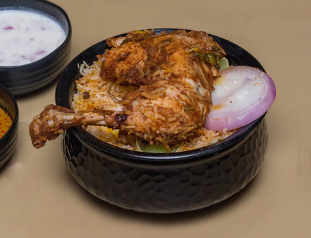 Joint Roast Biryani (2 Pcs) (Served With Raita And Salan)