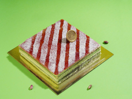 Raspberry Pista Lamington Cake