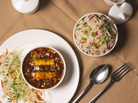 Paneer chilli gravy with veg fried rice and cabbage salad