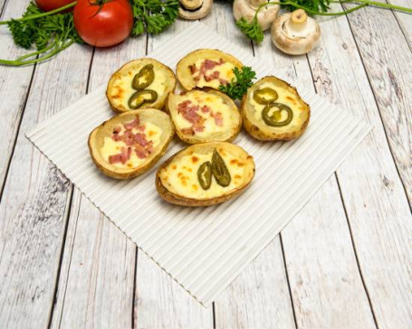 Six Pieces Potato Skins With Cheese And Jalapeno
