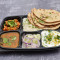 Aloo Gobhi Masala Dal Tadka Choice Of Rotis Rice Raita Salad
